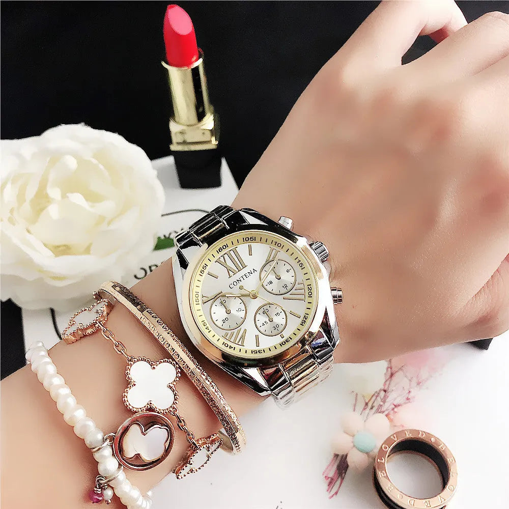Women's silver and rose gold mesh strap watch with diamond quartz movement and pointer display