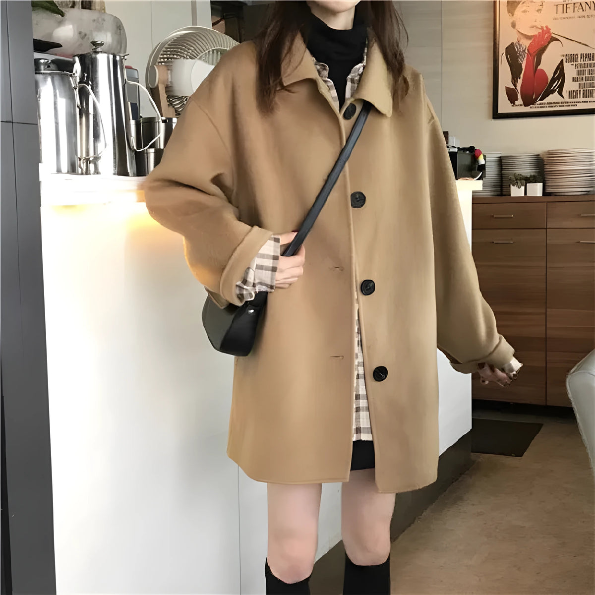 Women's loose mid-length Korean style overcoat in solid khaki or black with long sleeves, sizes M to 2XL