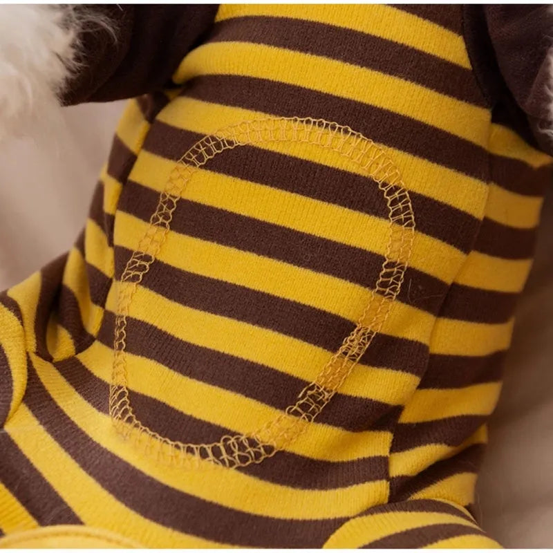 Yellow bee-patterned dog pajamas on small dog, four-legged full coverage suit with lapel collar