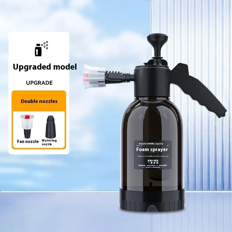 Black 2 litre foam watering can with hand-held sprayer and two nozzle attachments