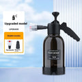Black 2 litre foam watering can with hand-held sprayer and two nozzle attachments