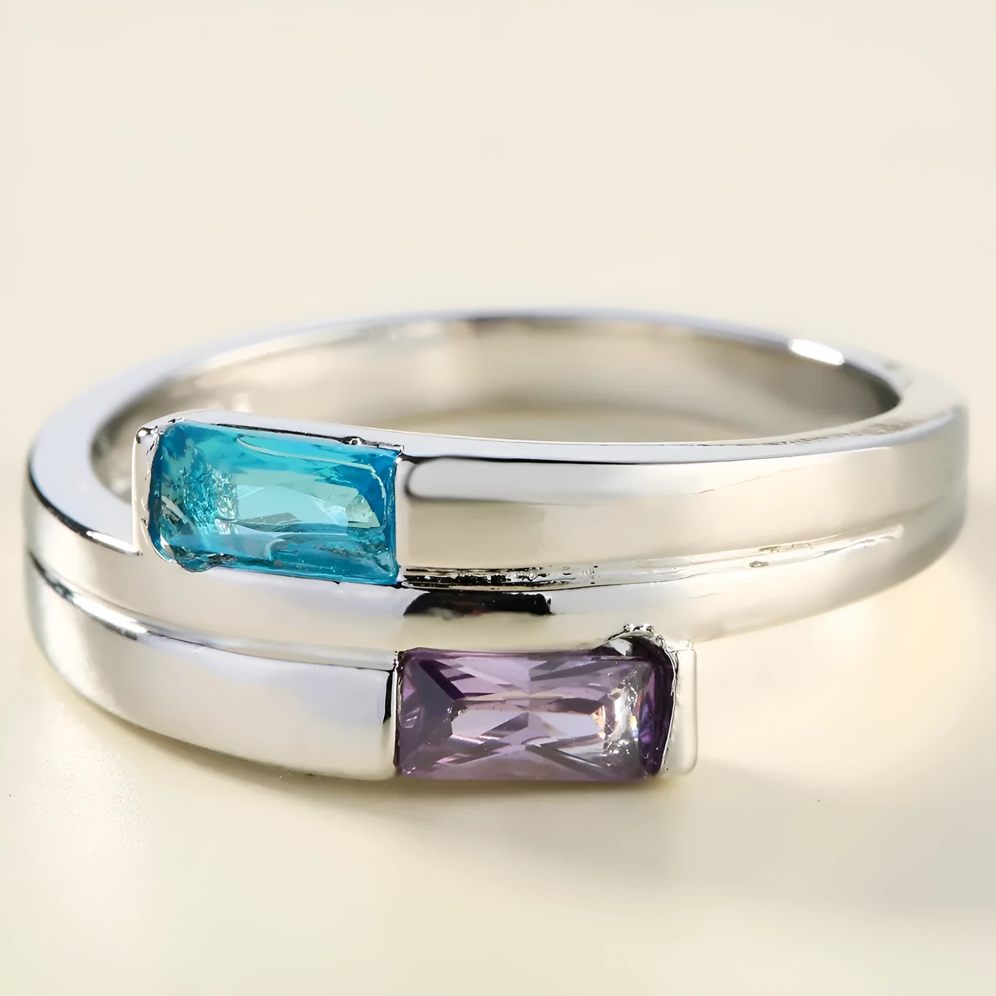 Silver electroplated copper ring with zircon stones, unisex European and American style fashion accessory.
