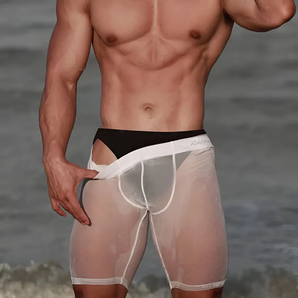 Men's black mesh seamless shorts with hip lift design on a solid colour background