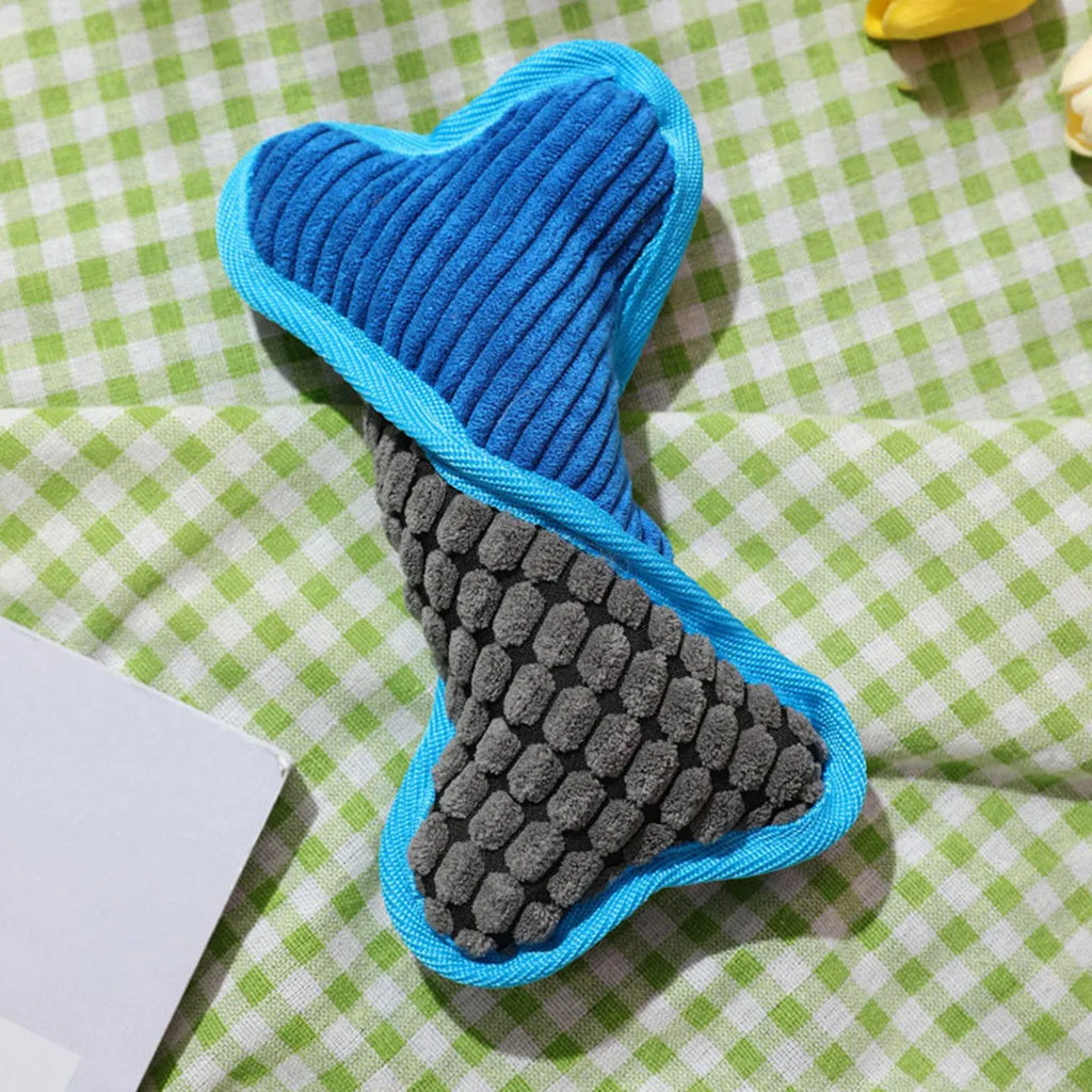 Blue bite-resistant teddy dog toy with a squeaker bone and soft corn fleece lining
