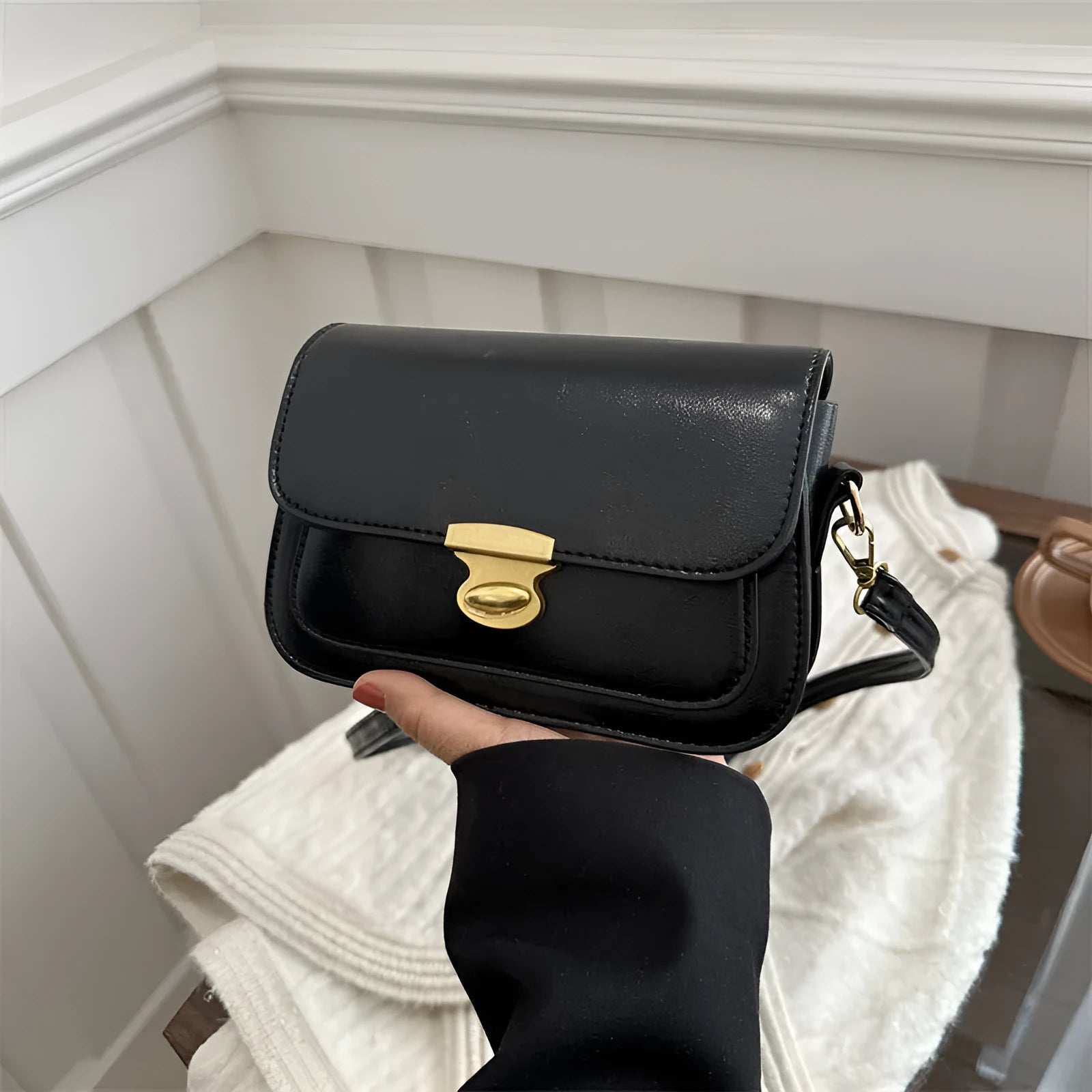 Retro-style square handbag in soft PU leather showing horizontal structure and shoulder strap