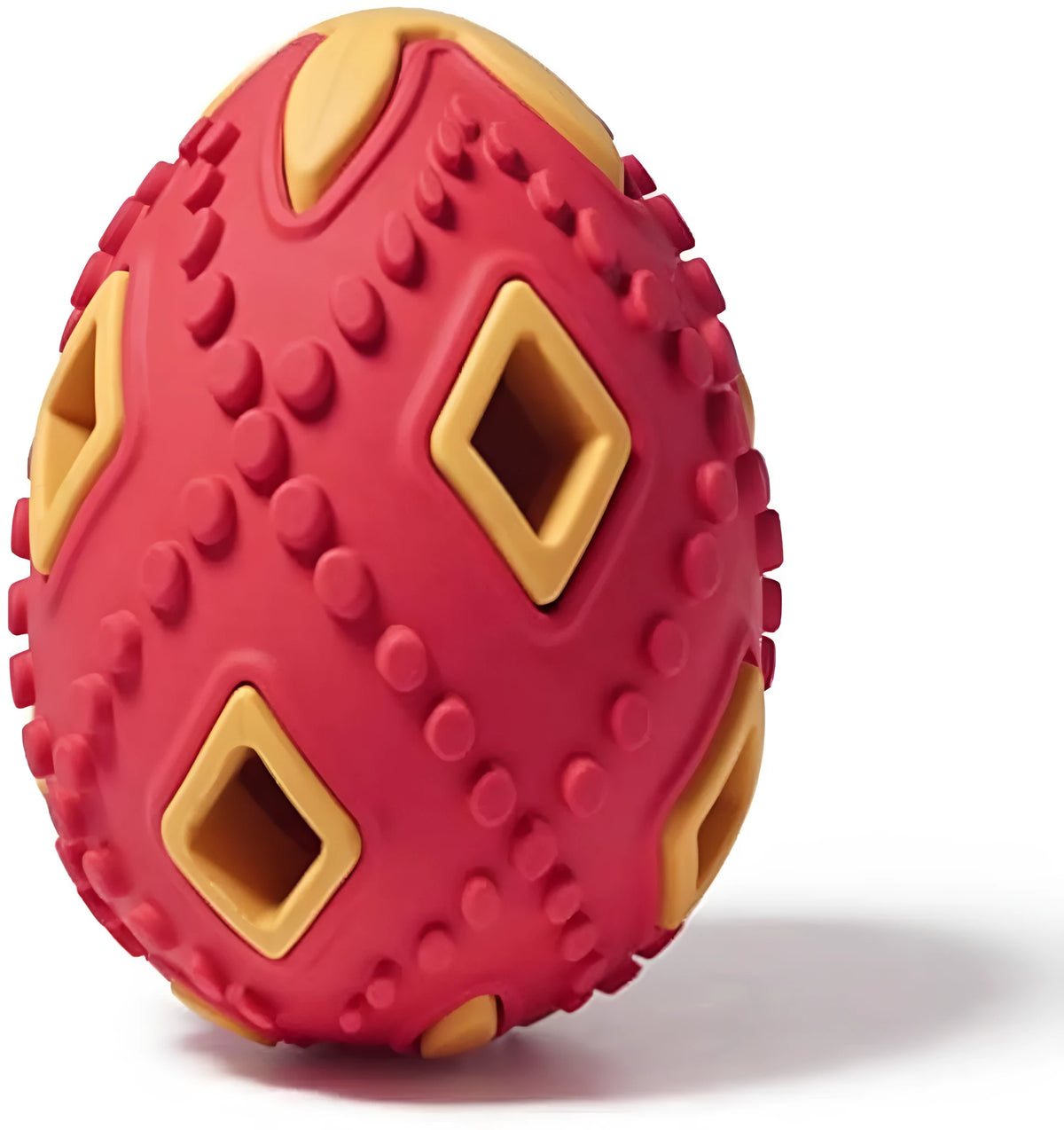Egg-shaped puppy teething chew toy with hollow treat centre, ragged surface, purple or red, for small dogs.