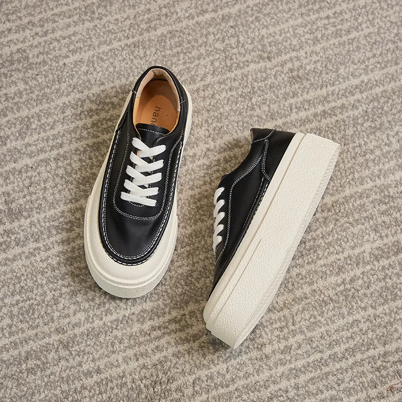 Women's black platform casual sports board shoes with tied design and round toe