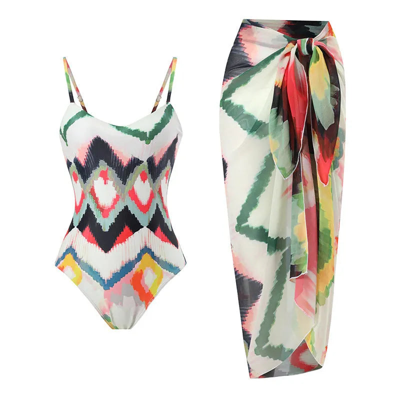 Women's two-piece swimsuit set with matching hip skirt in striped gradient pattern