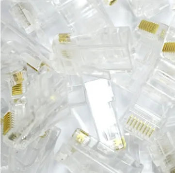 White RJ45 network modular plug showing gold-plated three-fork contacts and all-copper insert construction