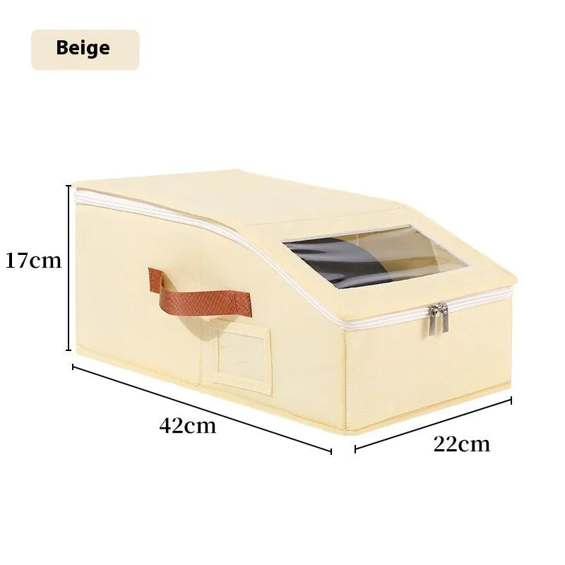 Grey foldable woven fabric storage box with lid, shown with dimensions 42cm by 22cm by 17cm.
