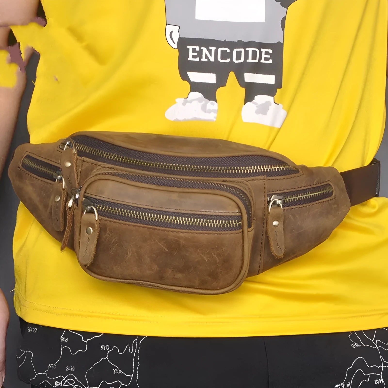 Genuine cowhide leather messenger bag in dark crazy horse colour showing shoulder strap and main compartment.