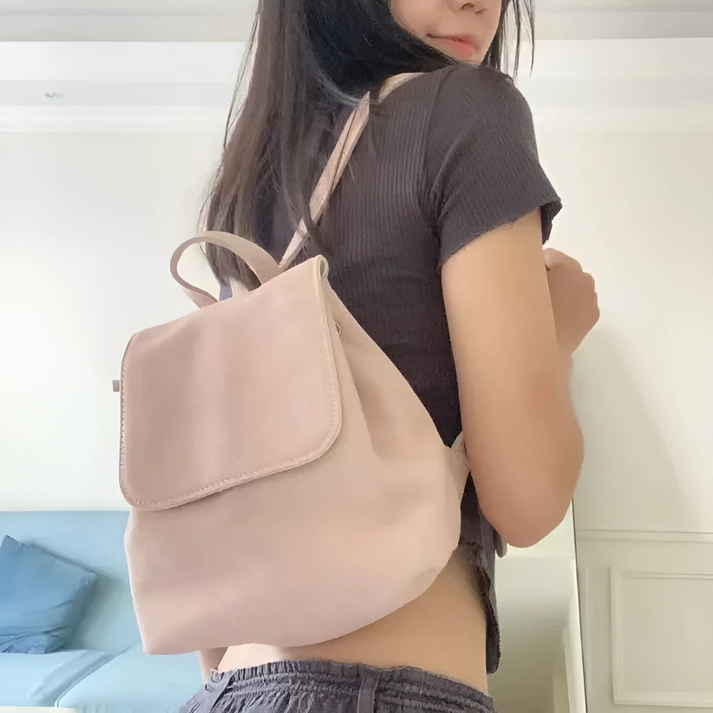 Retro suede girls backpack in brown or pink with polyester outer and suede leather lining