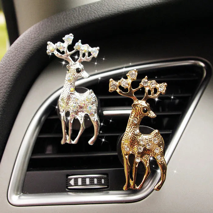Alloy car perfume clip with liquid fruity scent attached to air vent in various cartoon styles