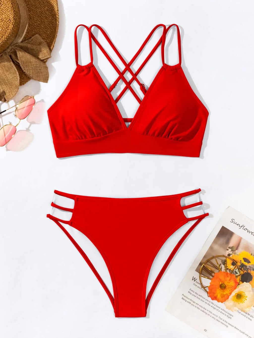 Women's black V-neck halter bikini with split shorts on a neutral background.