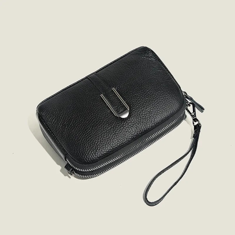 Minimalist crossbody bag in top-grain leather with spliced design, horizontal square shape, inner zippered pocket