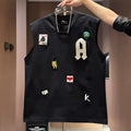 Men's black cotton sleeveless vest t-shirt with a cartoon graphic print, laid flat.