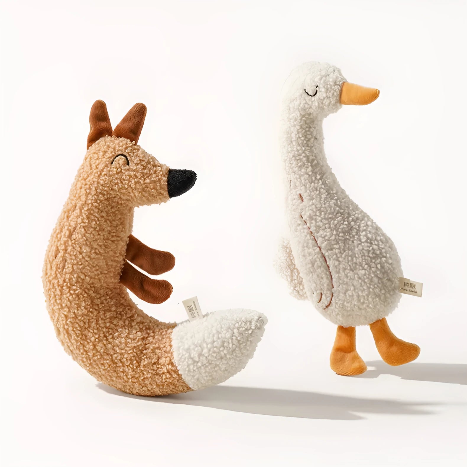 Cartoon plush dog chew toy in Fox or Duckling design with squeaker inside