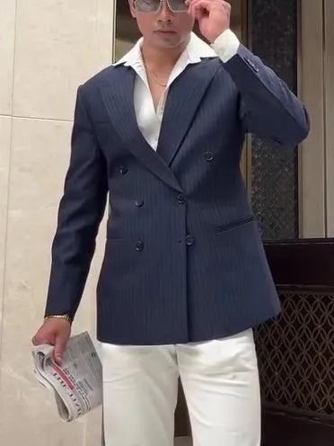 Men's striped double-breasted blazer showing regular fit and traditional tailoring details