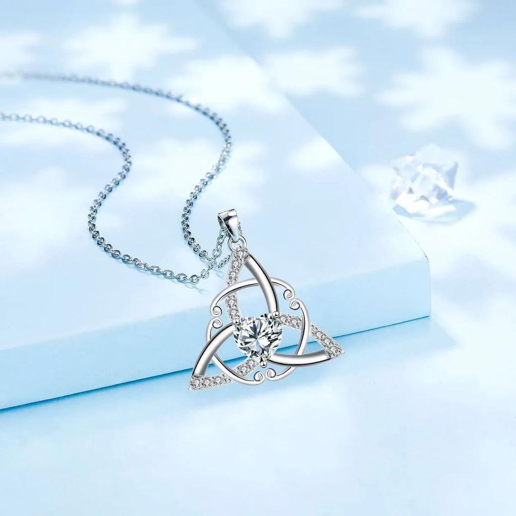 Geometric Celtic knot necklace pendant in copper with electroplated finish showing colour options