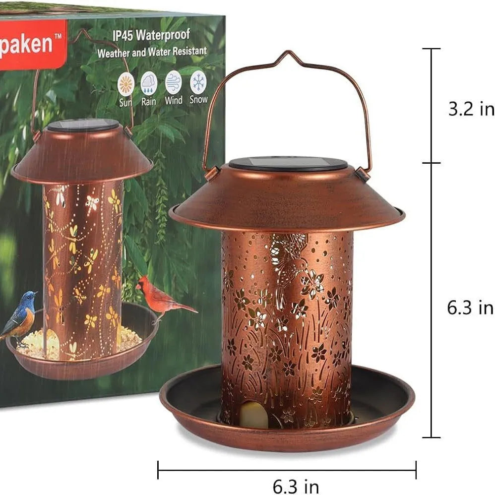Solar-powered iron art bird feeder with hummingbird pattern, functioning as an outdoor garden lamp.