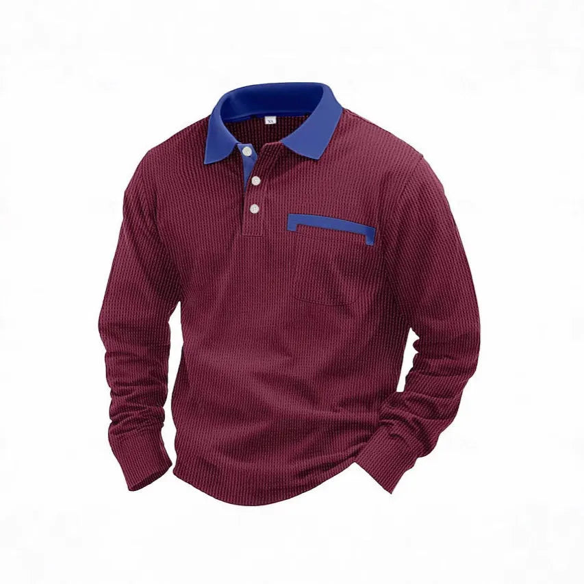 Man wearing a long-sleeved waffle-texture polo shirt in a solid colour, showcasing the retro style and asymmetric detail.