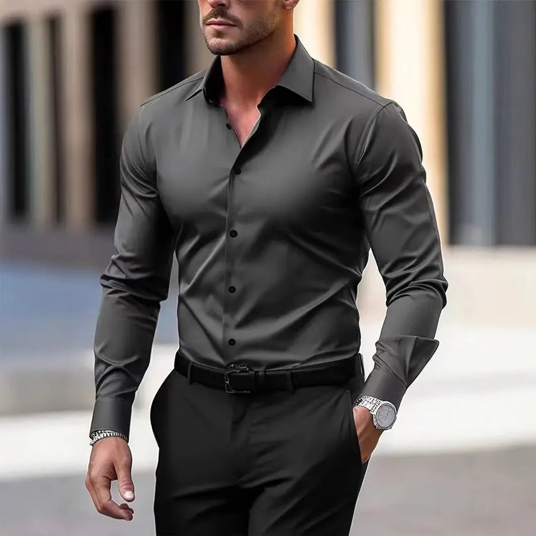 Men's solid colour velvet button down shirt in navy blue with long sleeves and lapel collar