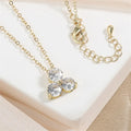 Tassel long necklace with electroplated copper water wave chain and round alloy pendant