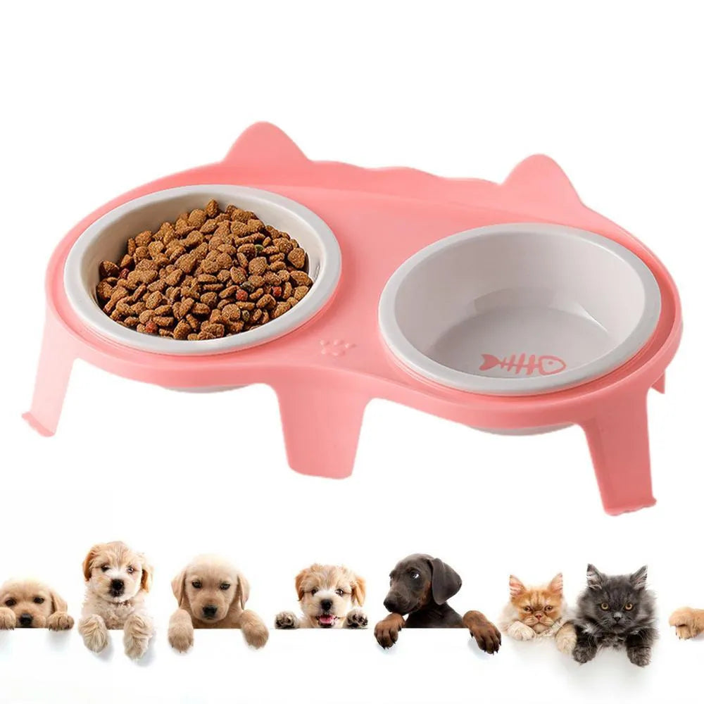 Blue ceramic cat food and water bowls on a white elevated plastic stand with a hook