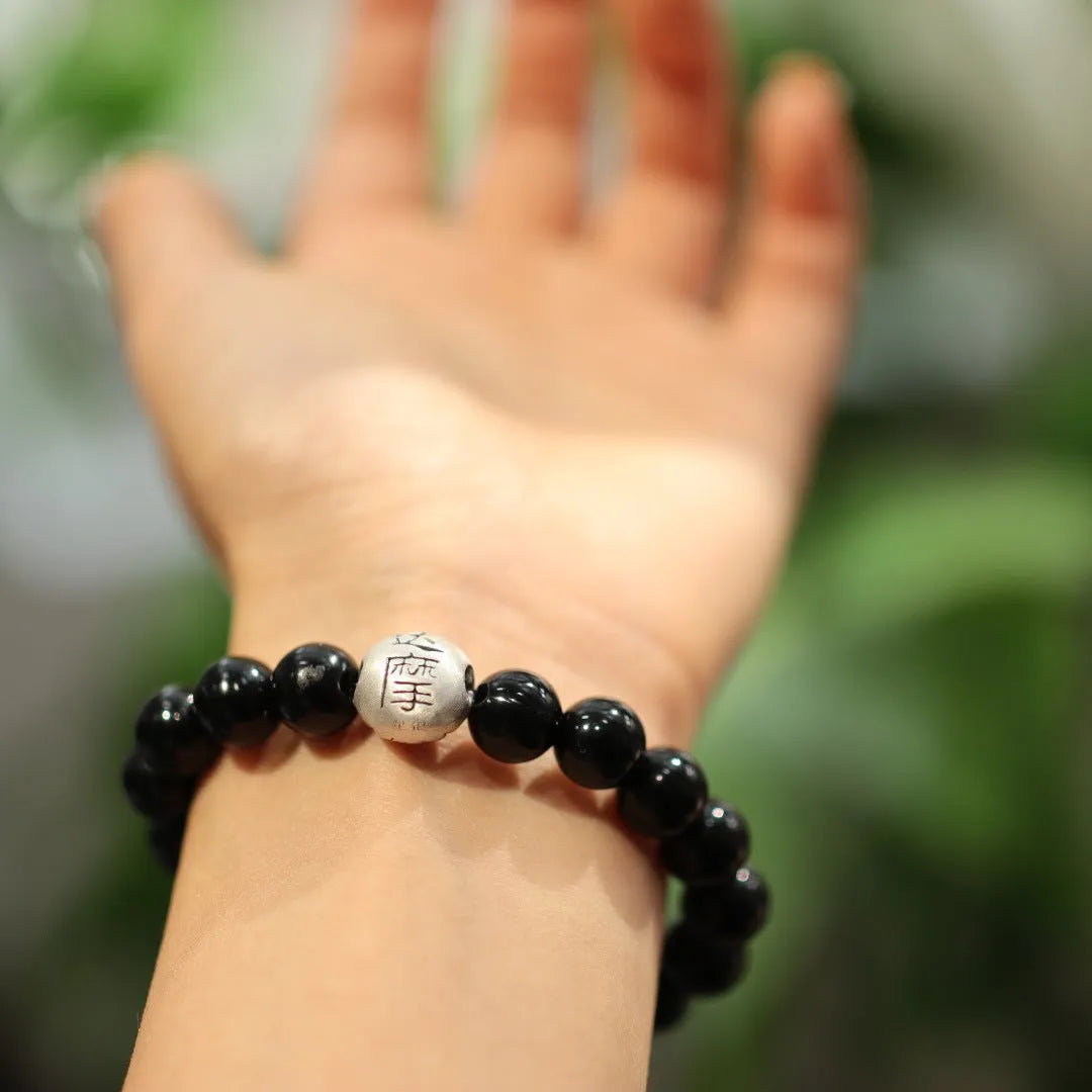 Black agate bracelet with 10mm beads and sterling silver components in Chinese style design