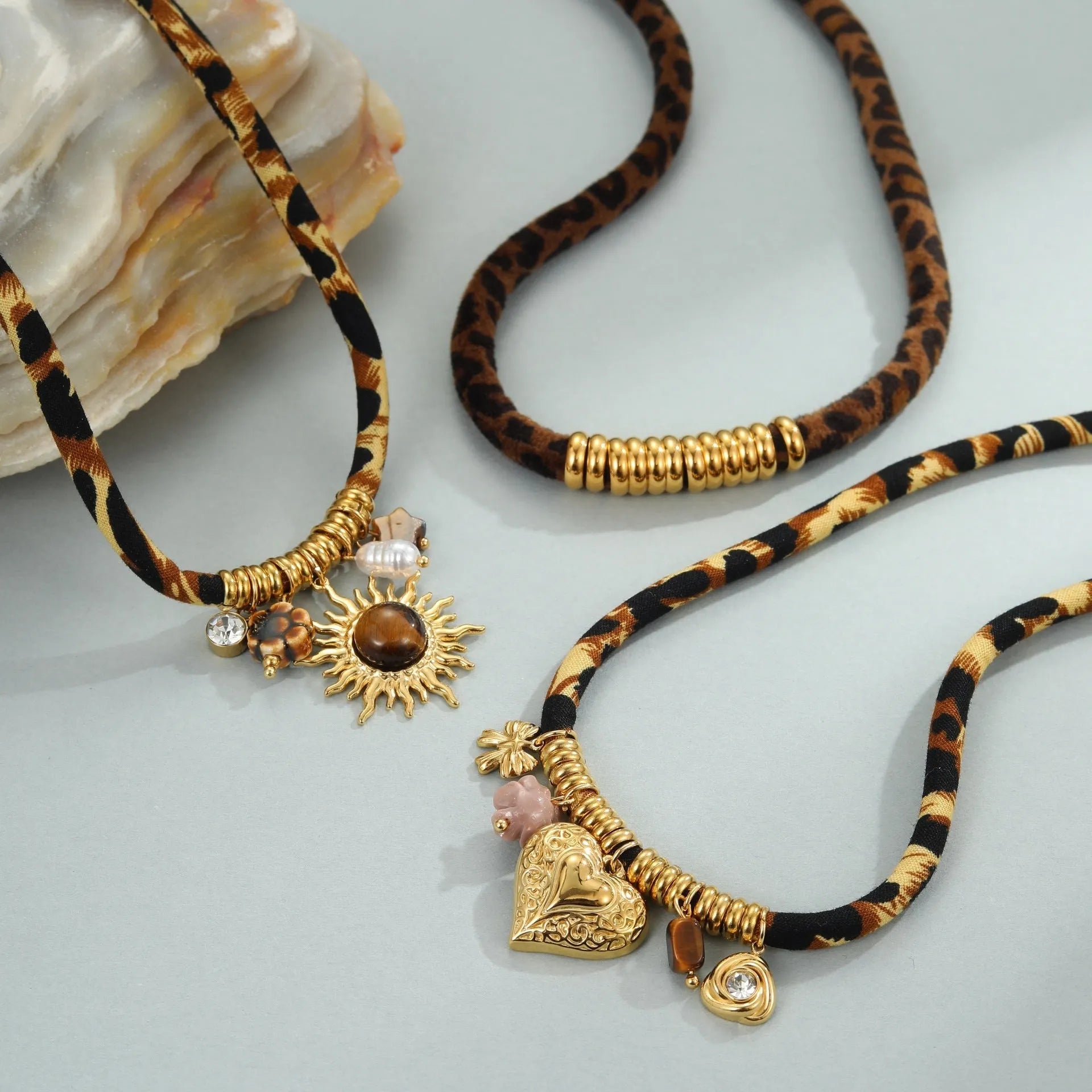 Leopard series stainless steel necklace with geometric pendant on a gold-colour chain