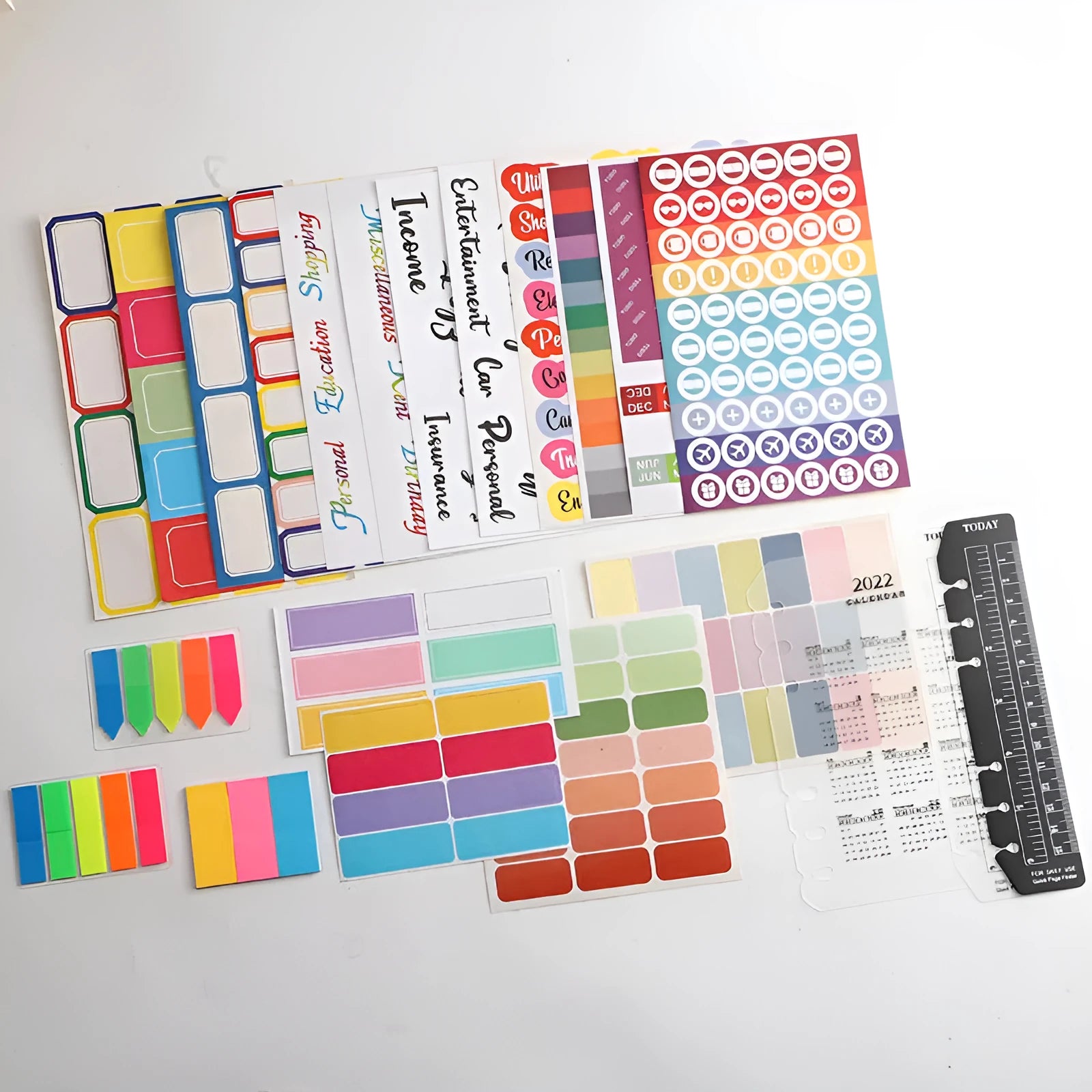 Paper adhesive sticker set showing multiple grid designs, sticky notes, and A6 rulers in various colours