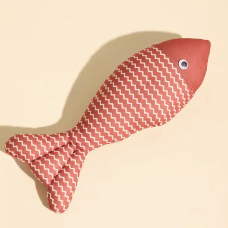 Yellow soft fabric cat toy shaped like a fish, a catnip-filled toy for feline play.