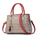 Printed PU ladies handbag with zip closure, horizontal square shape and single shoulder strap in khaki print.