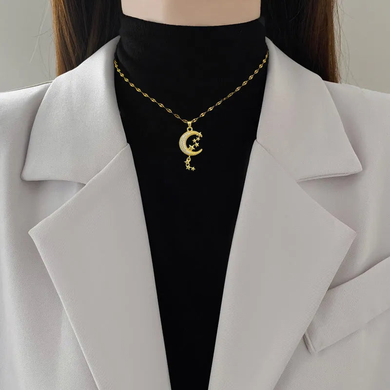 Moon tassel necklace in stainless steel with copper geometric pendant on image-style chain