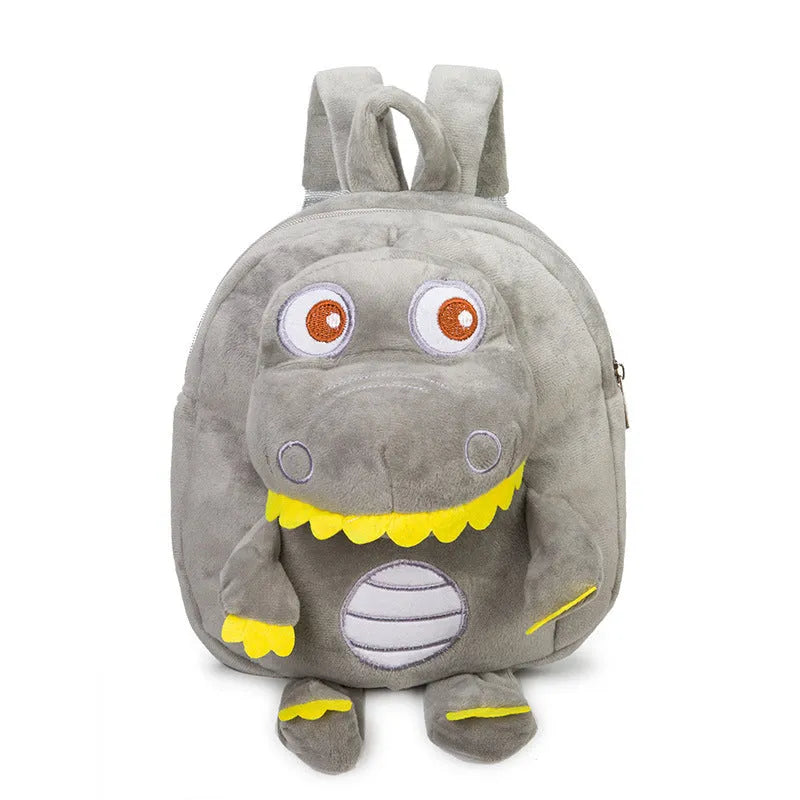 Blue soft plush dinosaur character backpack for children with embroidery, a soft handle, and backpack straps.