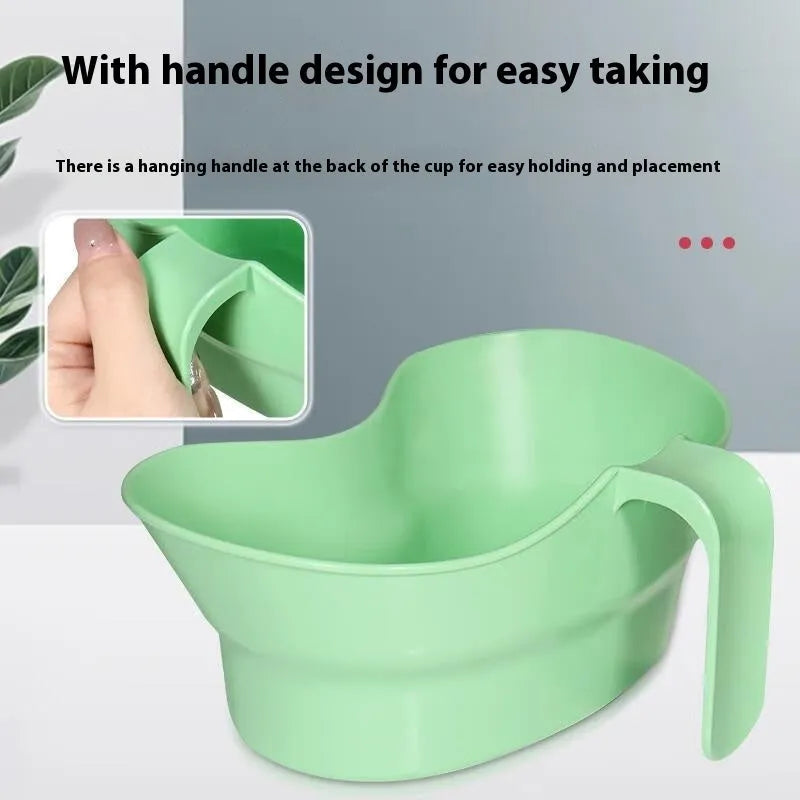 Green plastic gargle cup for elderly patient oral care assistance