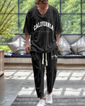 Trousers suit with V-neck jacket and cropped sleeves in thin polyester fabric