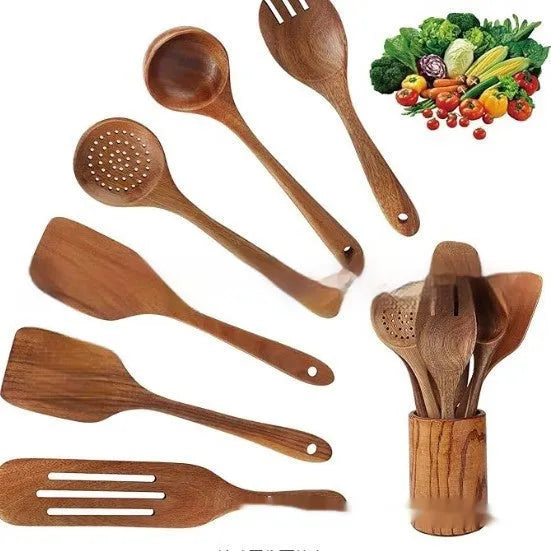 A set of seven wooden kitchen utensils including spoons and spatulas arranged together.