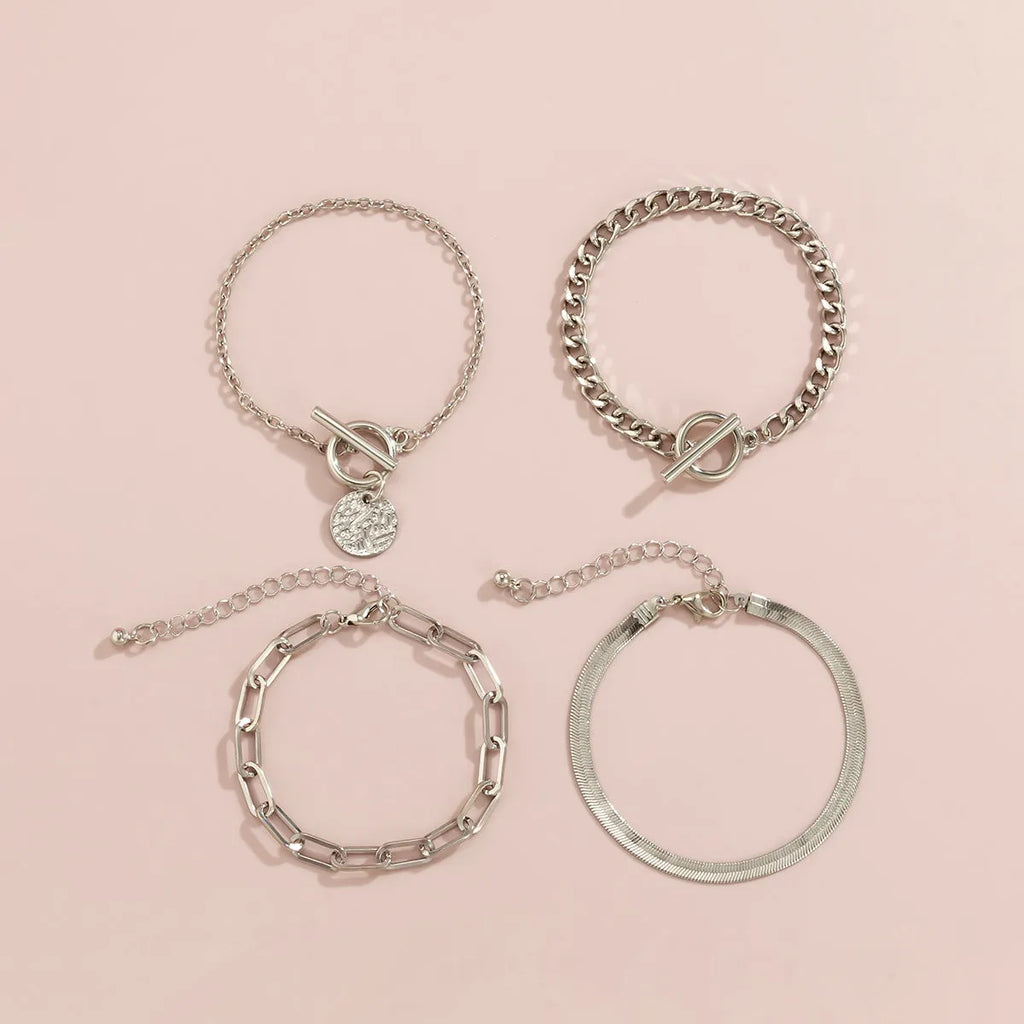 Set of 4 metal chain bracelets in gold or silver with snake bone and hollow chain designs