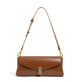 Milky white cowhide leather women's cross-body bag with pillow shape and cross-body strap.