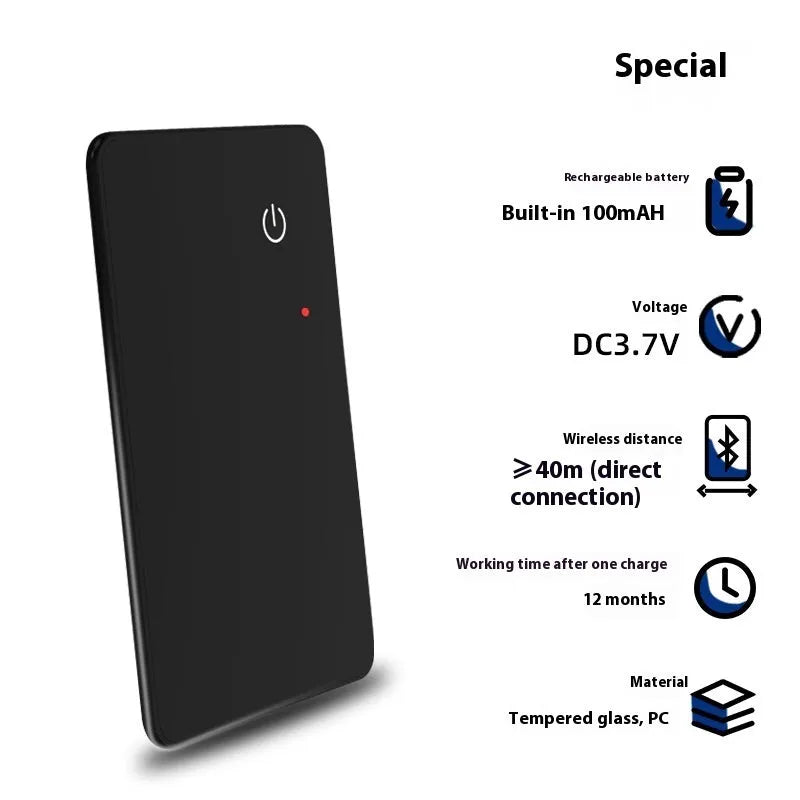 Black pet tracking device with wireless charging and NFC features measuring 85mm by 54mm