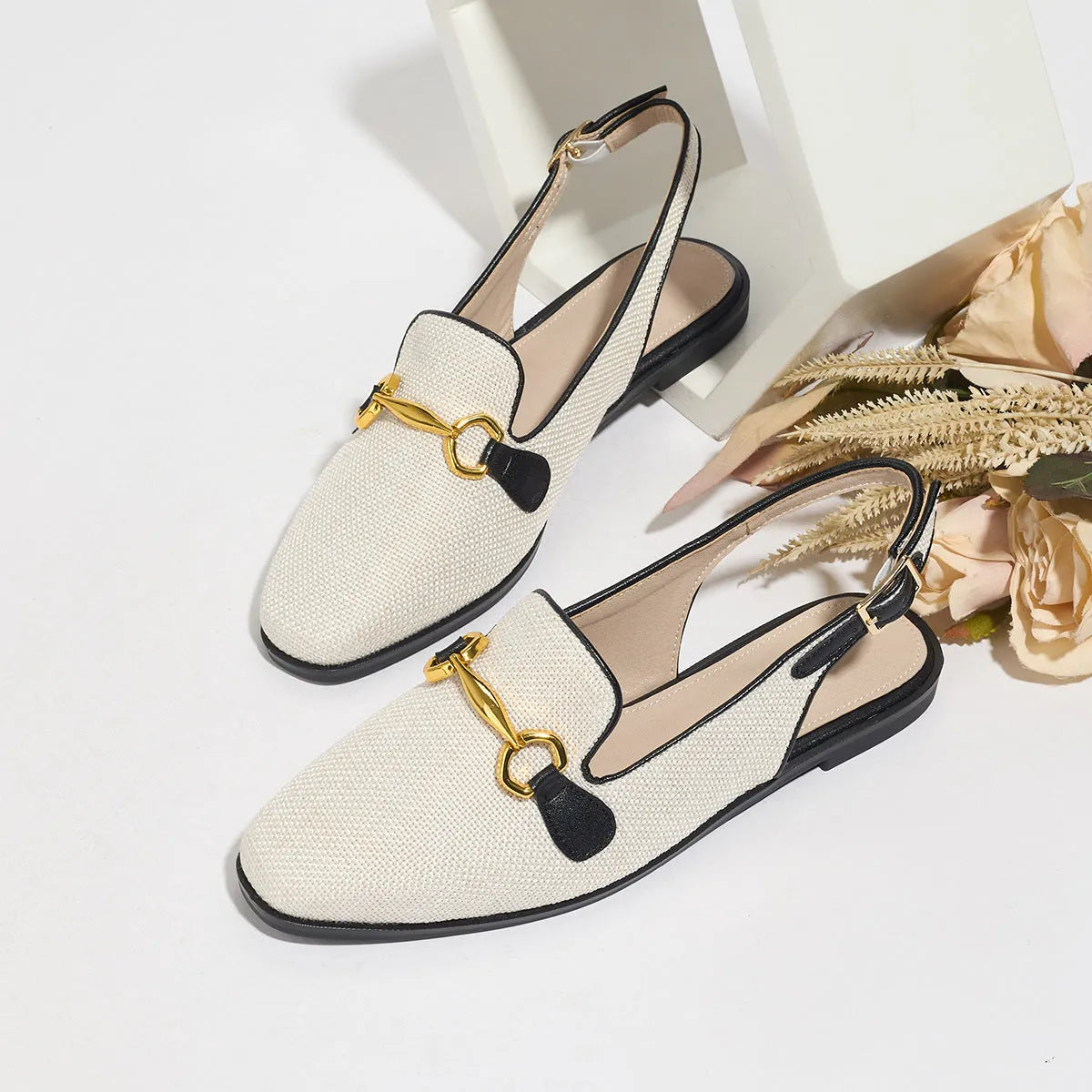 Women's closed toe half slippers with chunky low heel in black linen and imitation leather lining