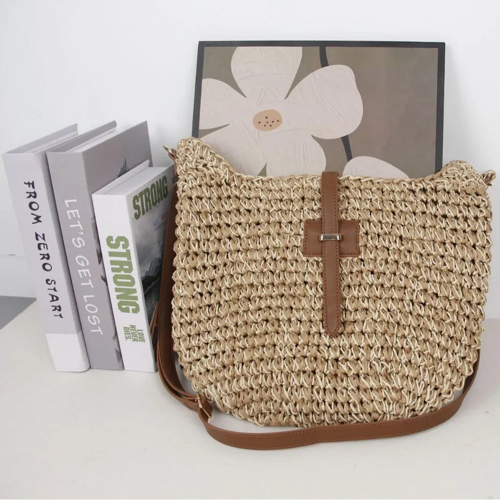 Beige handmade woven shoulder bag with sandwich pocket construction and sewing thread detailing