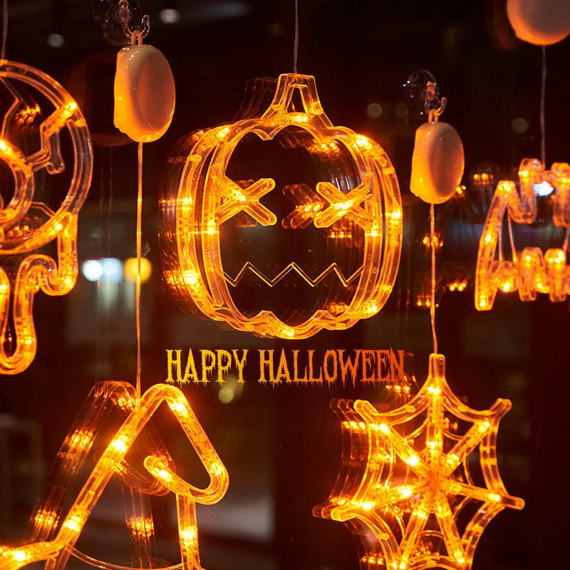 Halloween window hanging LED lights with ghost, spider, and pumpkin designs