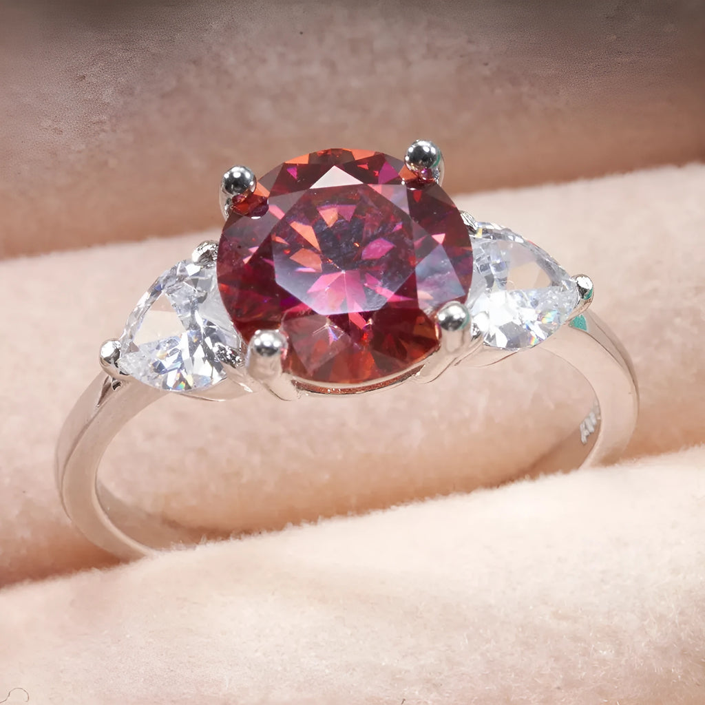 Sterling silver ring with 10mm round 3 karat moissanite stone in white colour on white background