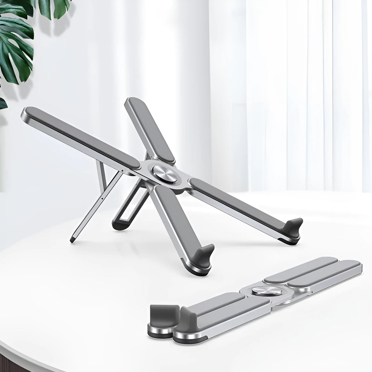 Foldable aluminium alloy laptop bracket in silver, measuring 280 x 23.5 x 46.5 mm