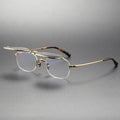 Men's flip-up polarized sunglasses with pure titanium frame in gold, silver, or bronze, black and grey AC lenses, retro box shape.