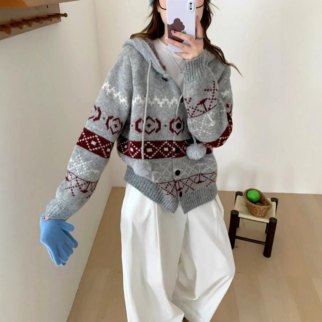 Loose fit brocade sweater coat for women in grey with geometric pattern.