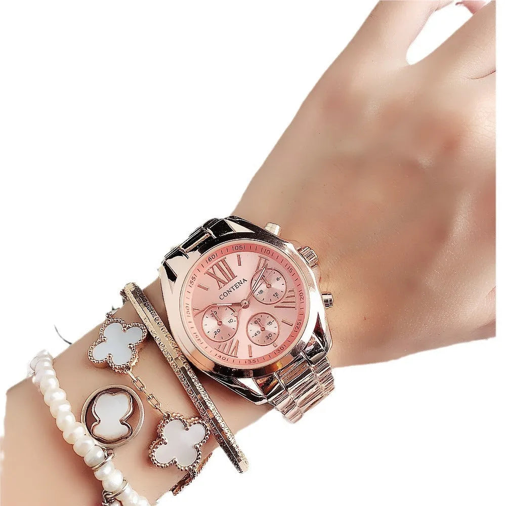Women's silver and rose gold mesh strap watch with diamond quartz movement and pointer display