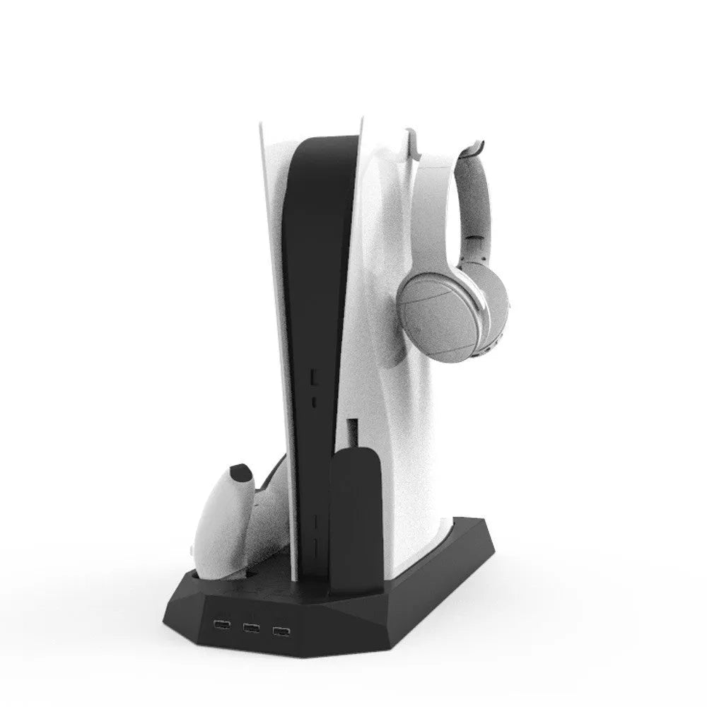 White PS5 charging and cooling dock station with two controllers on charge and headset on hook